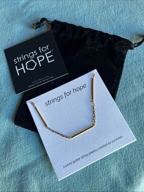 Strings for Hope Gold V-Shaped Bar Necklace